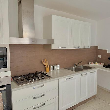 Appartamento Ibiscus Cannigione Buitenkant foto